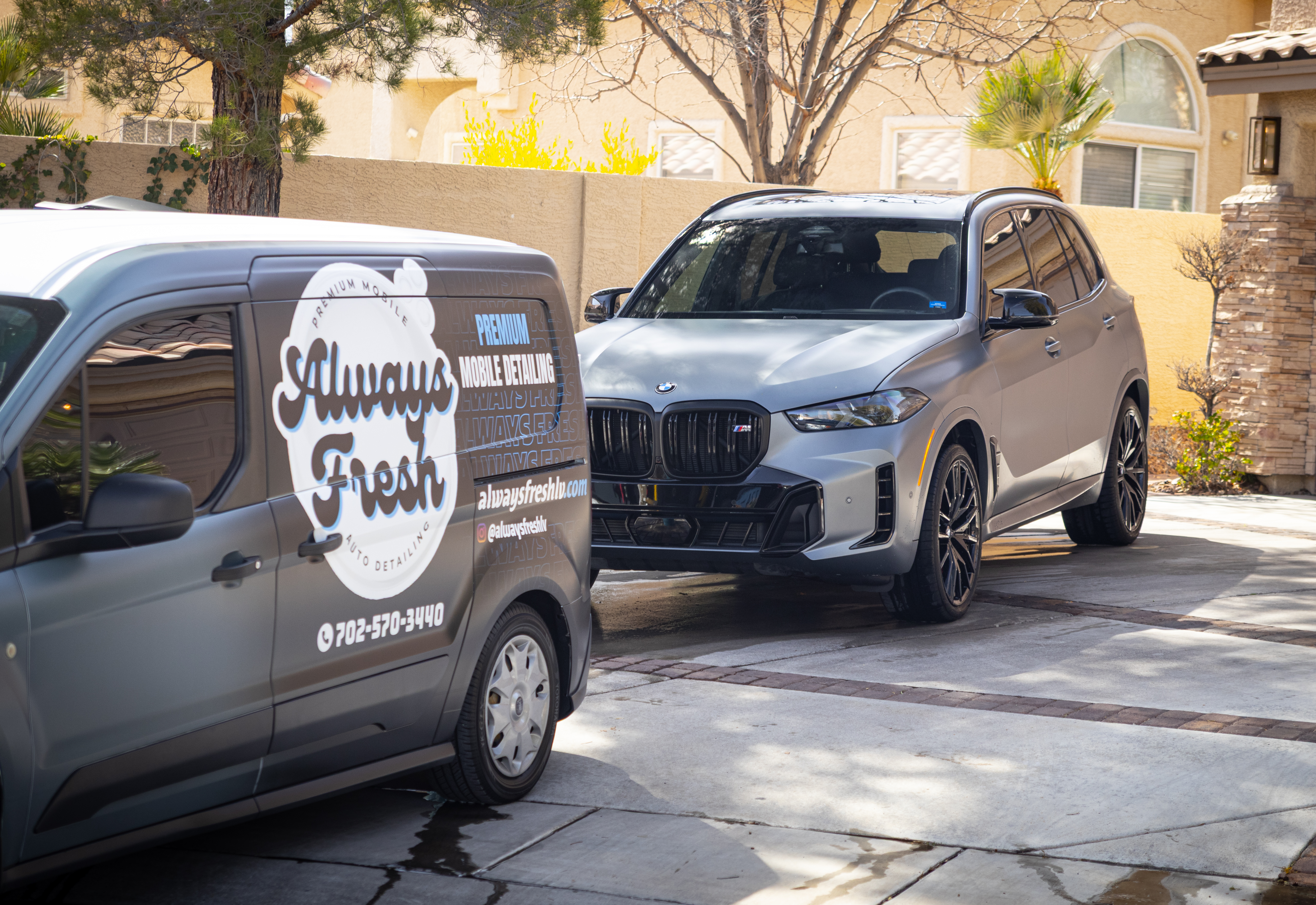 Always Fresh LV van parked beside a freshly detailed BMW X5