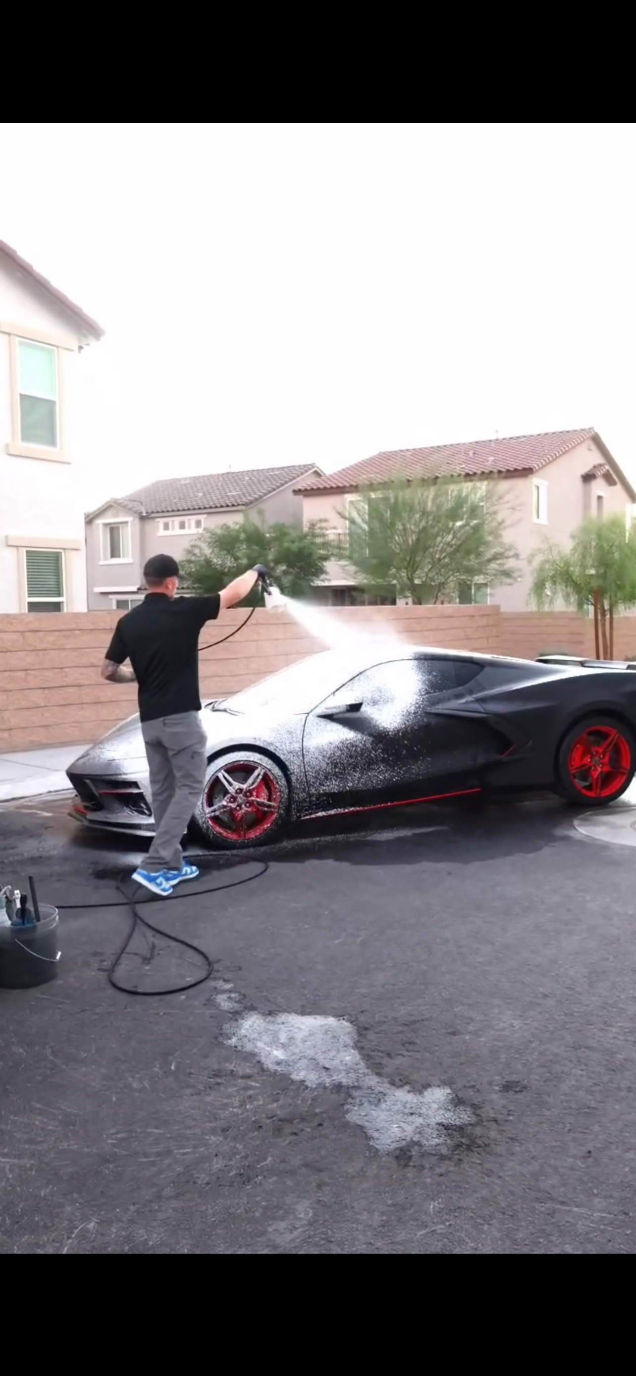Corvette getting pressure washed during mobile detail